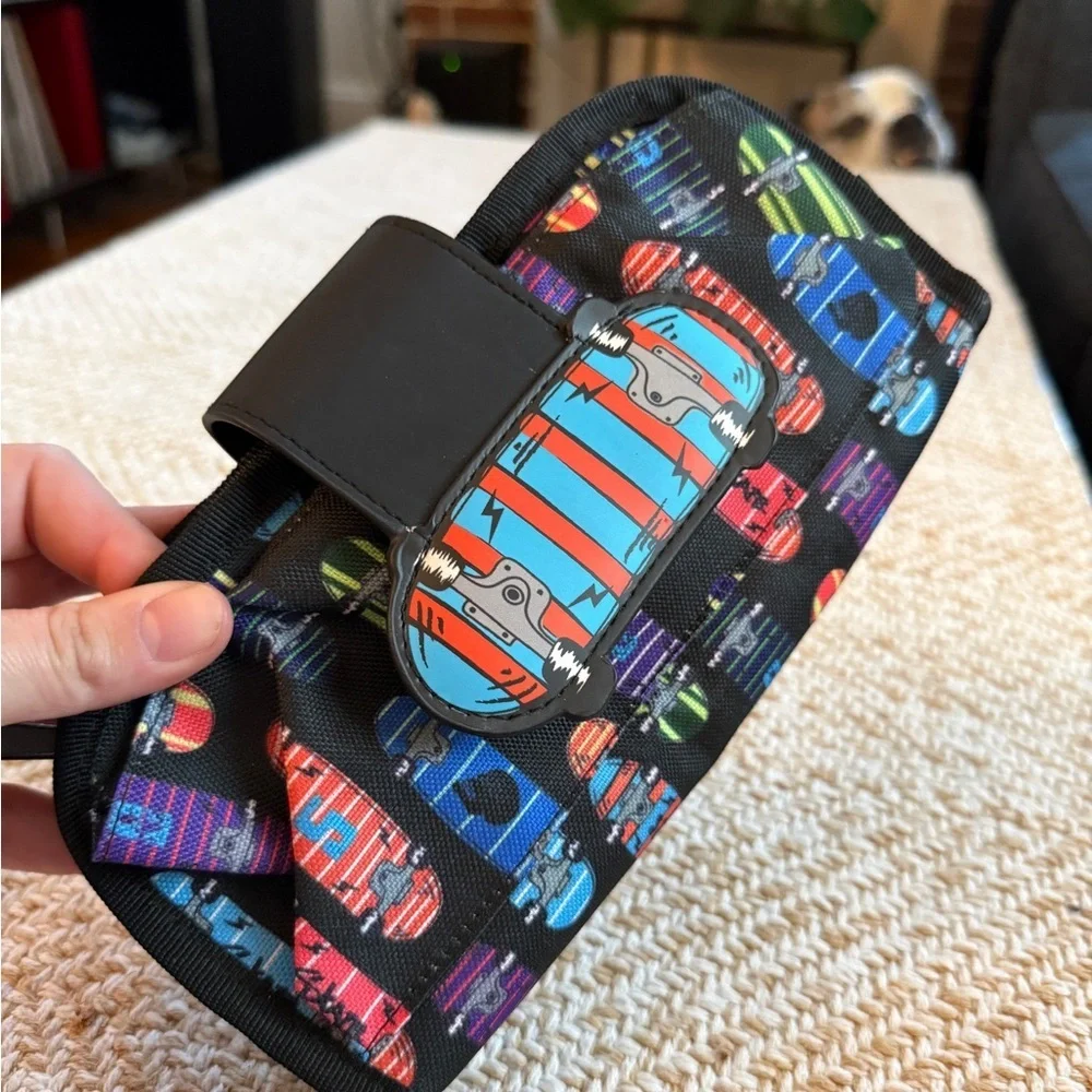 ZIPIT brand fanny pack or hip pouch, featuring a vibrant skateboard pattern